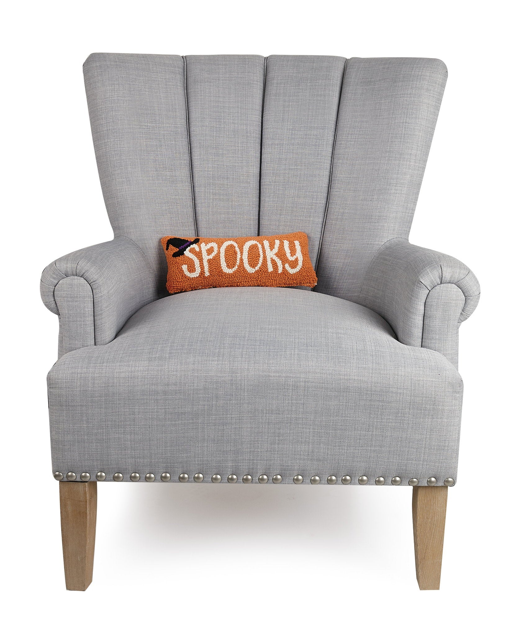 Spooky Hooked Wool Halloween Throw Pillow on an armchair, showing the throw pillow at room scale, 12x5 inch