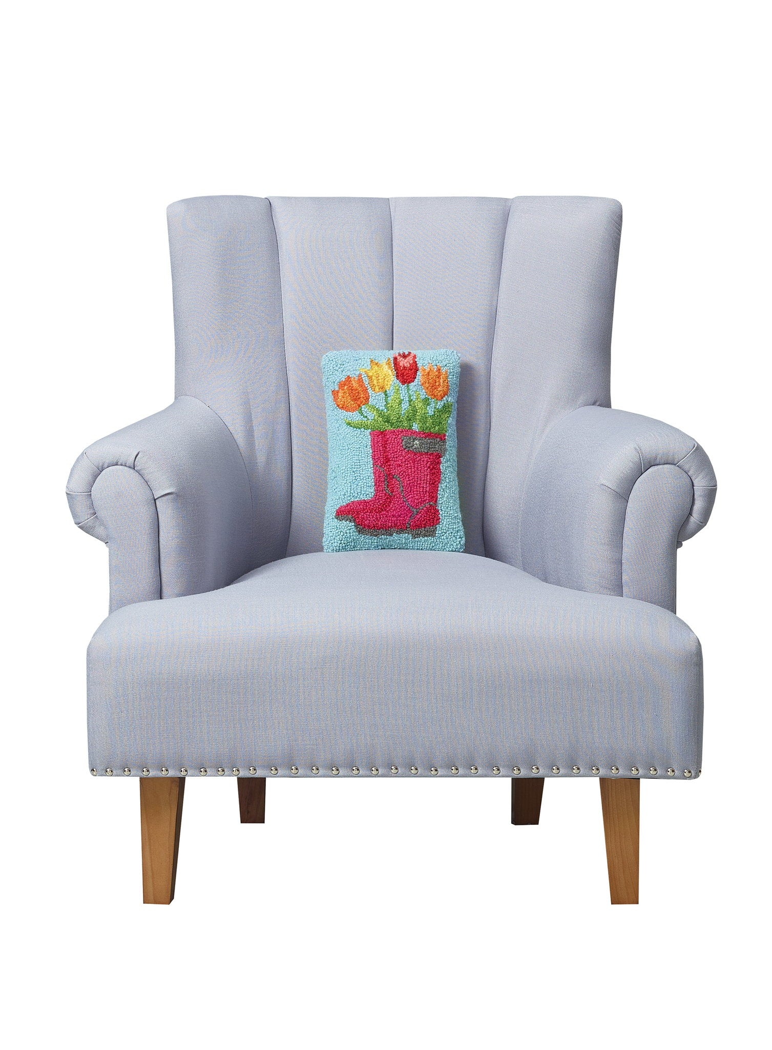 Spring Boot Tulips Hooked Wool Throw Pillow on an armchair, showing the throw pillow at room scale, 8x12 inch