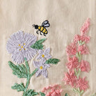 Closeup of Spring Floral with Bee Kitchen Towel showing print and fabric detail