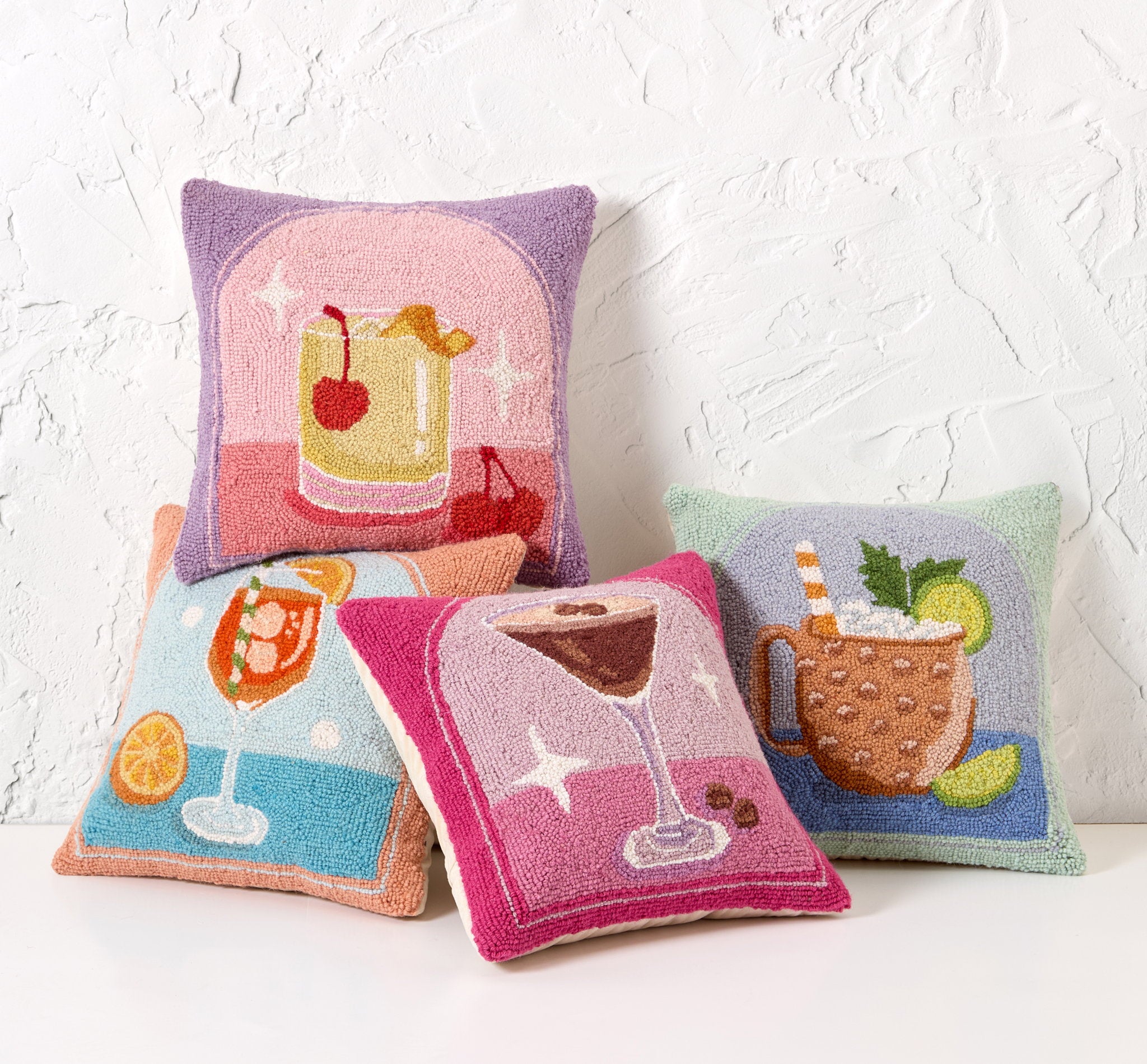 Spritz Hooked Wool Throw Pillow shown alongside other designs in the same collection, 16x16 inch