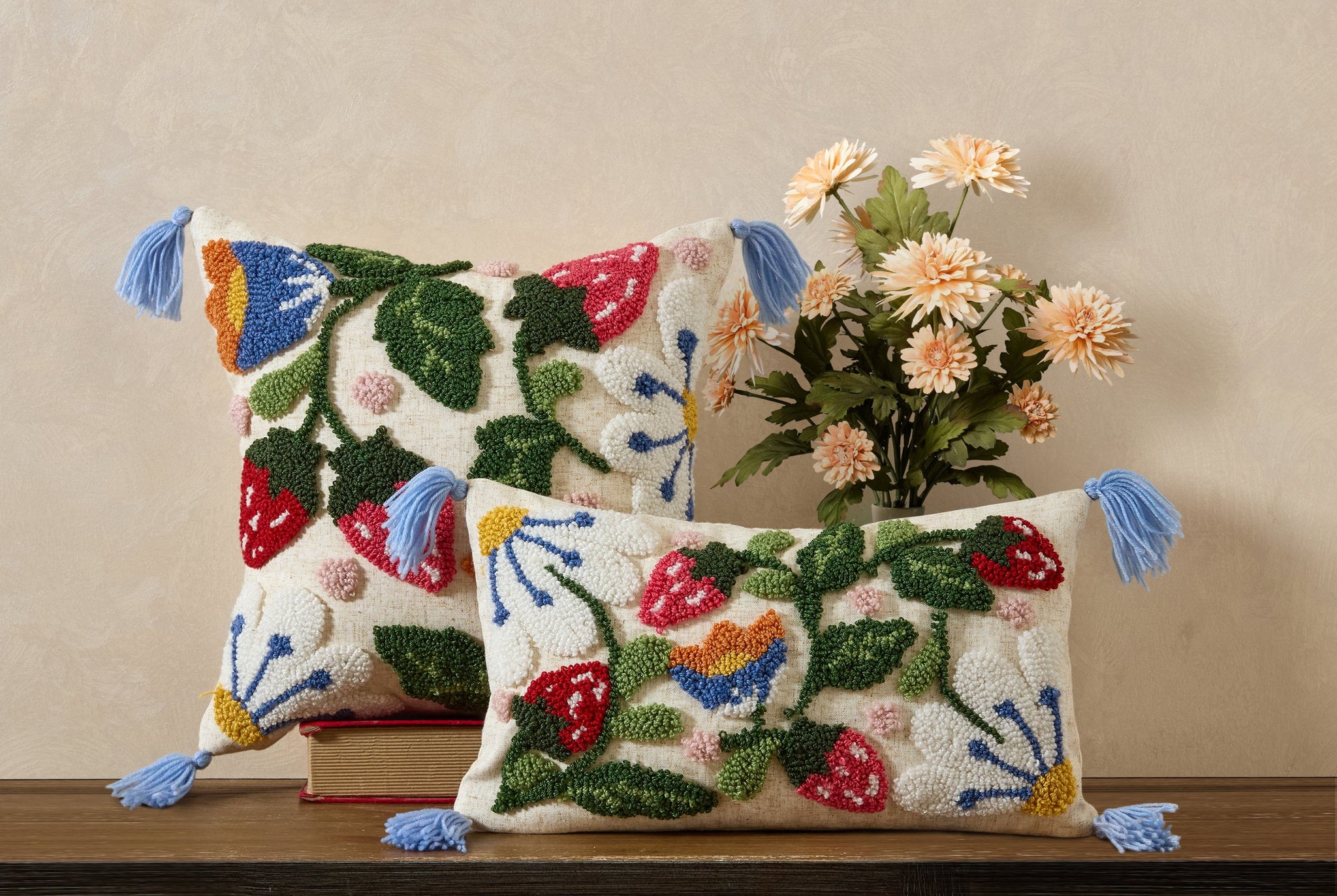 Strawberry Garden Tufted Hooked Wool Throw Pillow shown alongside other designs in the same collection, 9x16 inch