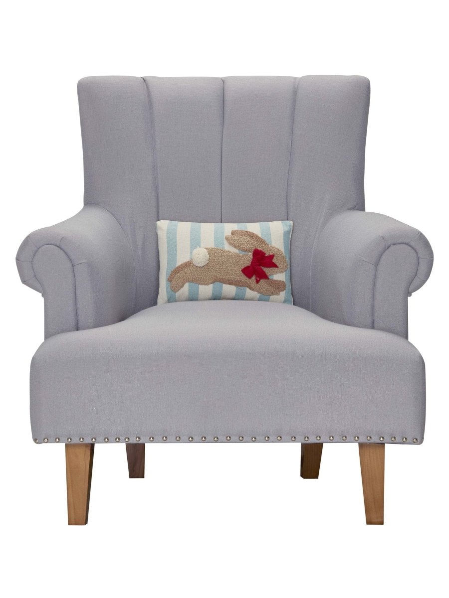 Stripe Bunny Hooked Easter Throw Pillow on an armchair, showing the throw pillow at room scale, 8x12 inch