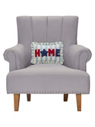Stripe Home Hooked Throw Pillow on an armchair, showing the throw pillow at room scale, 8x12 inch