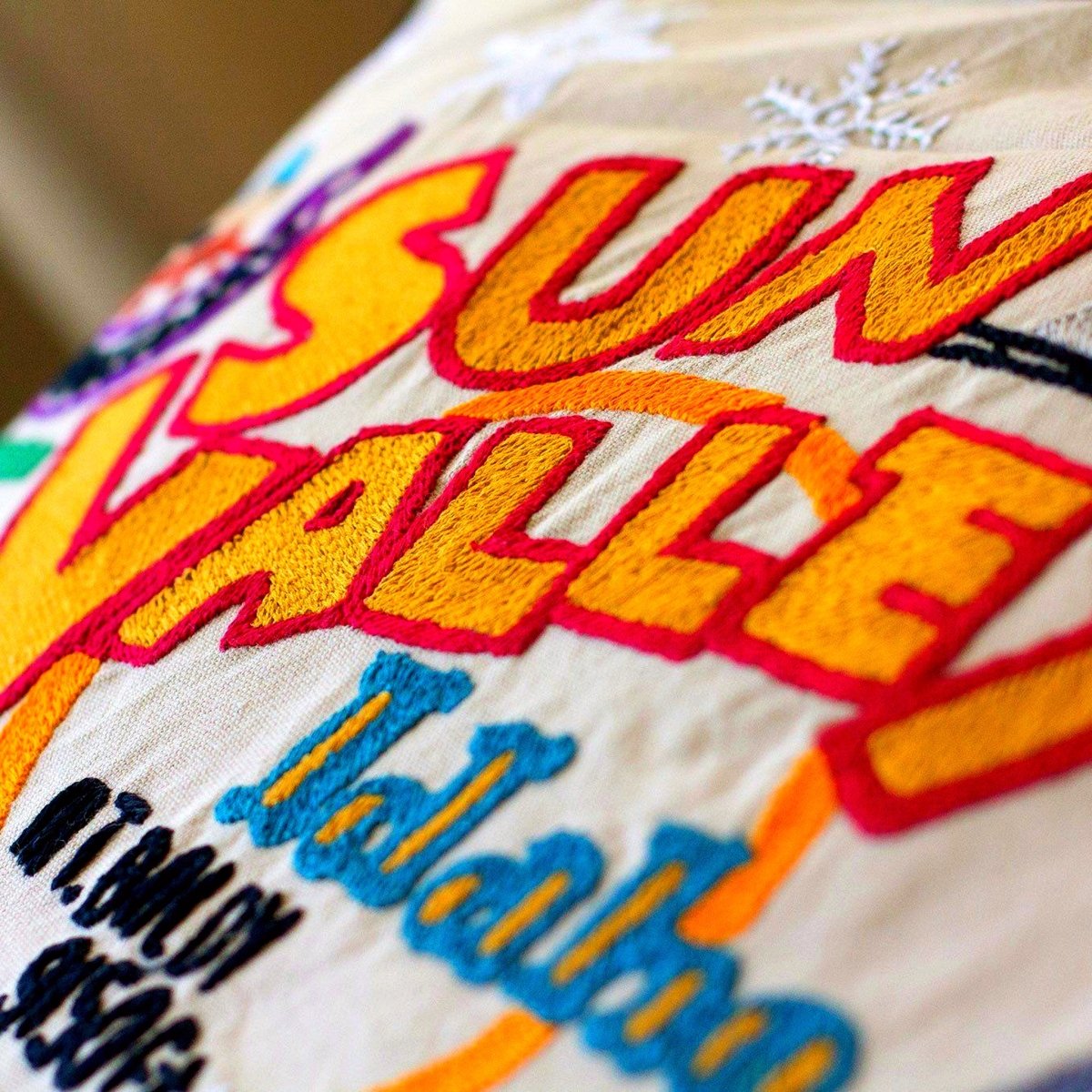 Sun Valley, ID Embroidered Ski Lodge Pillow - close-up detail of hand-embroidered needlepoint stitching
