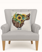 Sunflower Saddle Hooked Wool Throw Pillow on an armchair, showing the throw pillow at room scale, 16x16 inch