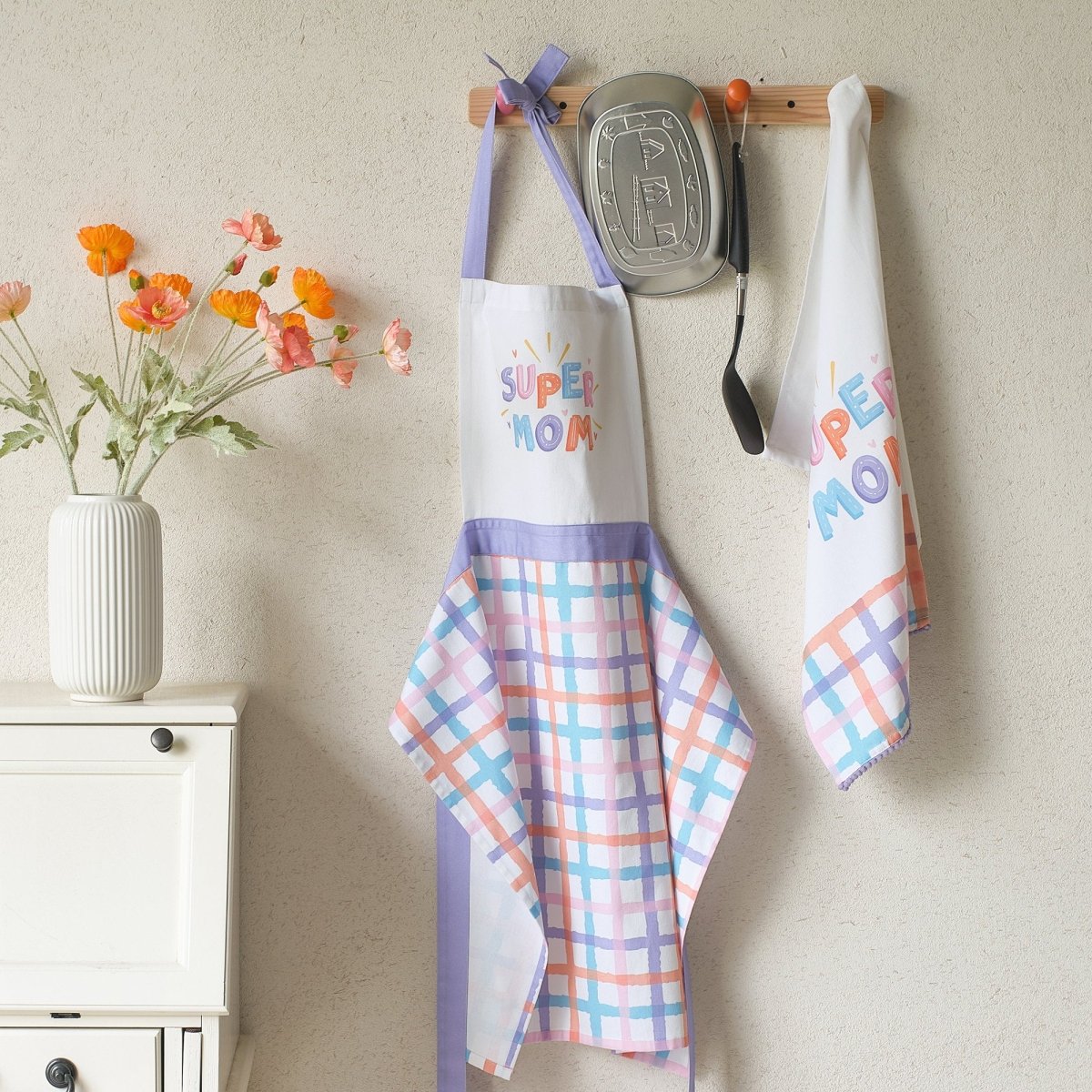 Super Mom Apron shown alongside other designs in the same collection, 28x34 inch