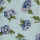 Closeup of Teal & Purple Floral Hooked Wool Christmas Stocking showing stitch texture and craftsmanship detail