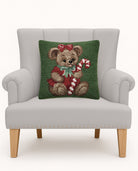 Teddy Bear Hooked Wool Christmas Throw Pillow on an armchair, showing the throw pillow at room scale, 16x16 inch
