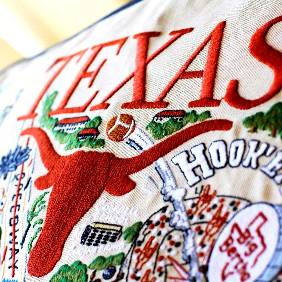 Texas Longhorns Embroidered College Pillow - close-up detail of hand-embroidered needlepoint stitching