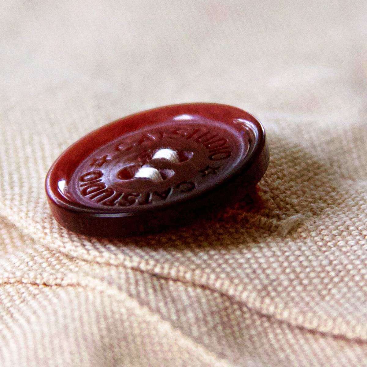 Texas State Lone Star Travel Embroidered Throw Pillow - detail of decorative button closure