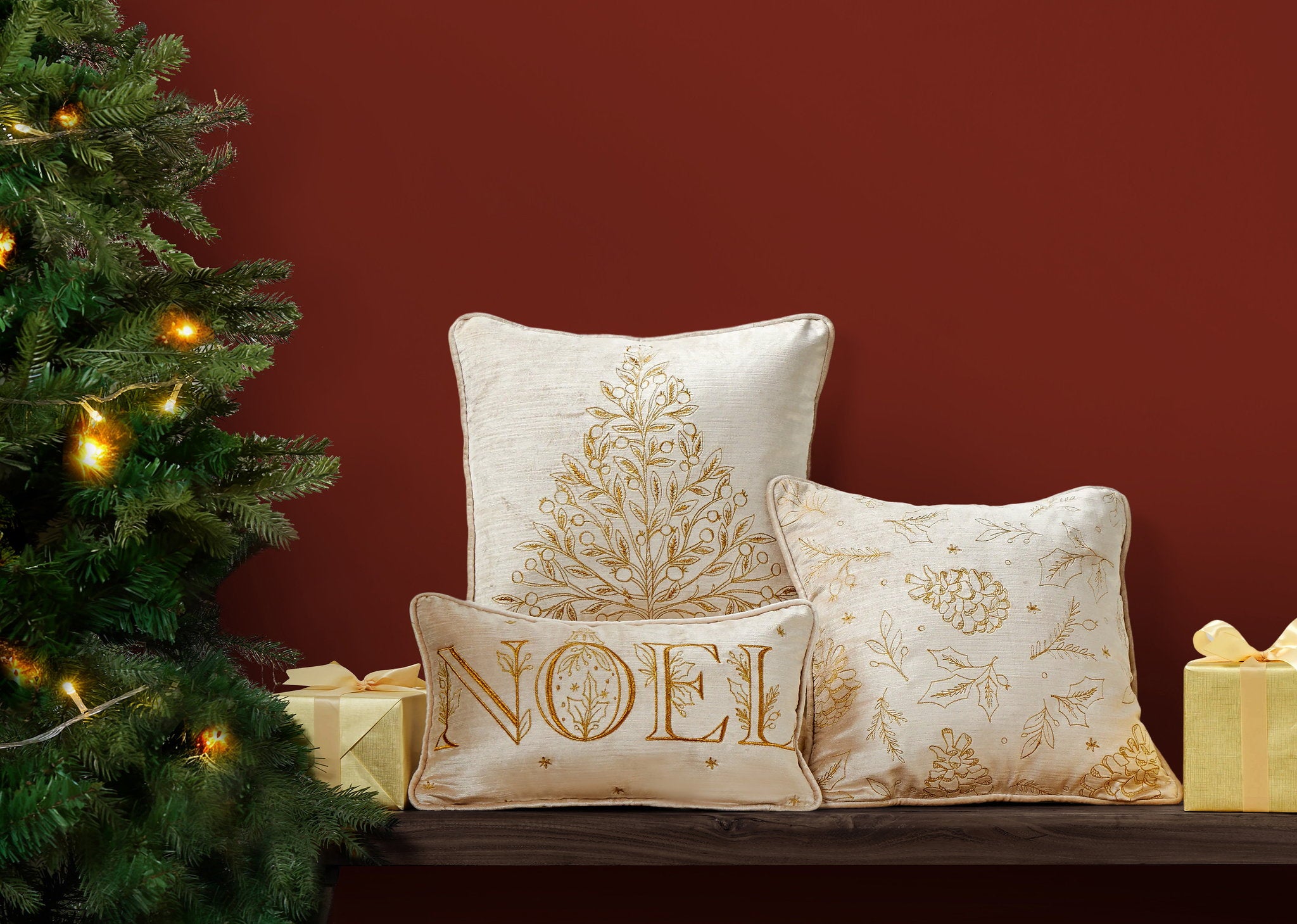 Tossed Foliage Champagne Velvet Embroidered Christmas Throw Pillow shown alongside other designs in the same collection, 16x16 inch