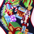 Closeup of Toy Train Needlepoint Christmas Stocking showing stitch texture and craftsmanship detail