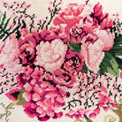 Closeup of Traditional Red Green Botanical needlepoint throw pillow highlighting hand-stitched wool craftsmanship and fabric detail
