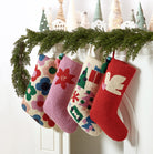 Tree Presents Hooked Wool Christmas Stocking shown alongside other designs in the same collection, 12x20 inch