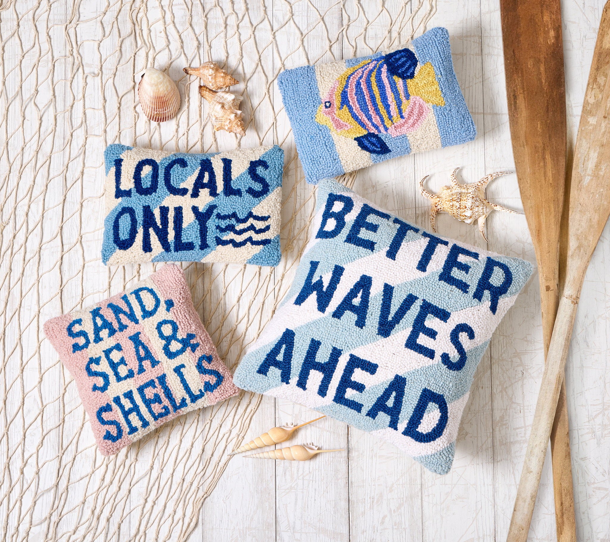 Tropical Fish Hooked Wool Throw Pillow shown alongside other designs in the same collection, 8x12 inch