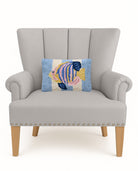 Tropical Fish Hooked Wool Throw Pillow on an armchair, showing the throw pillow at room scale, 8x12 inch