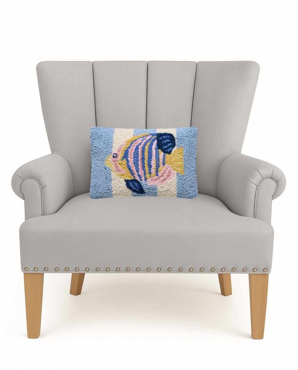 Tropical Fish Hooked Wool Throw Pillow on an armchair, showing the throw pillow at room scale, 8x12 inch