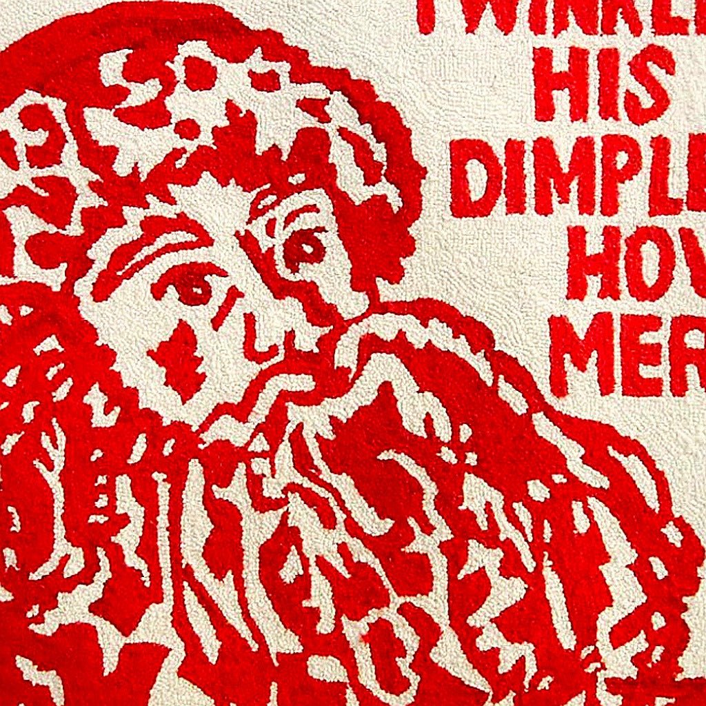 Hand-stitched wool detail of Twinkle Santa Holiday needlepoint rug showing intricate weave pattern and texture