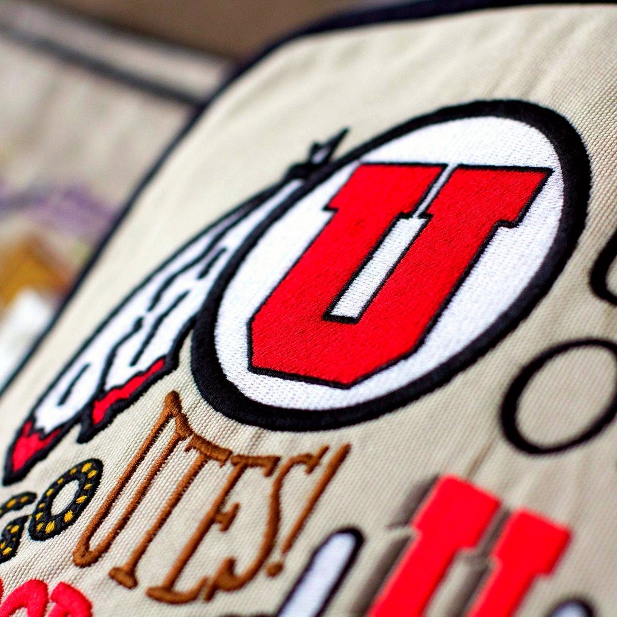 University of Utah Utes Embroidered College Pillow - close-up detail of hand-embroidered needlepoint stitching
