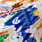 Utah Wasatch Range Embroidered Ski Lodge Pillow - close-up detail of hand-embroidered needlepoint stitching