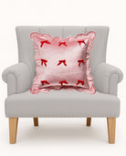 Velvet Scallop Ribbon Woven Throw Pillow on an armchair, showing the throw pillow at room scale, 16x16 inch