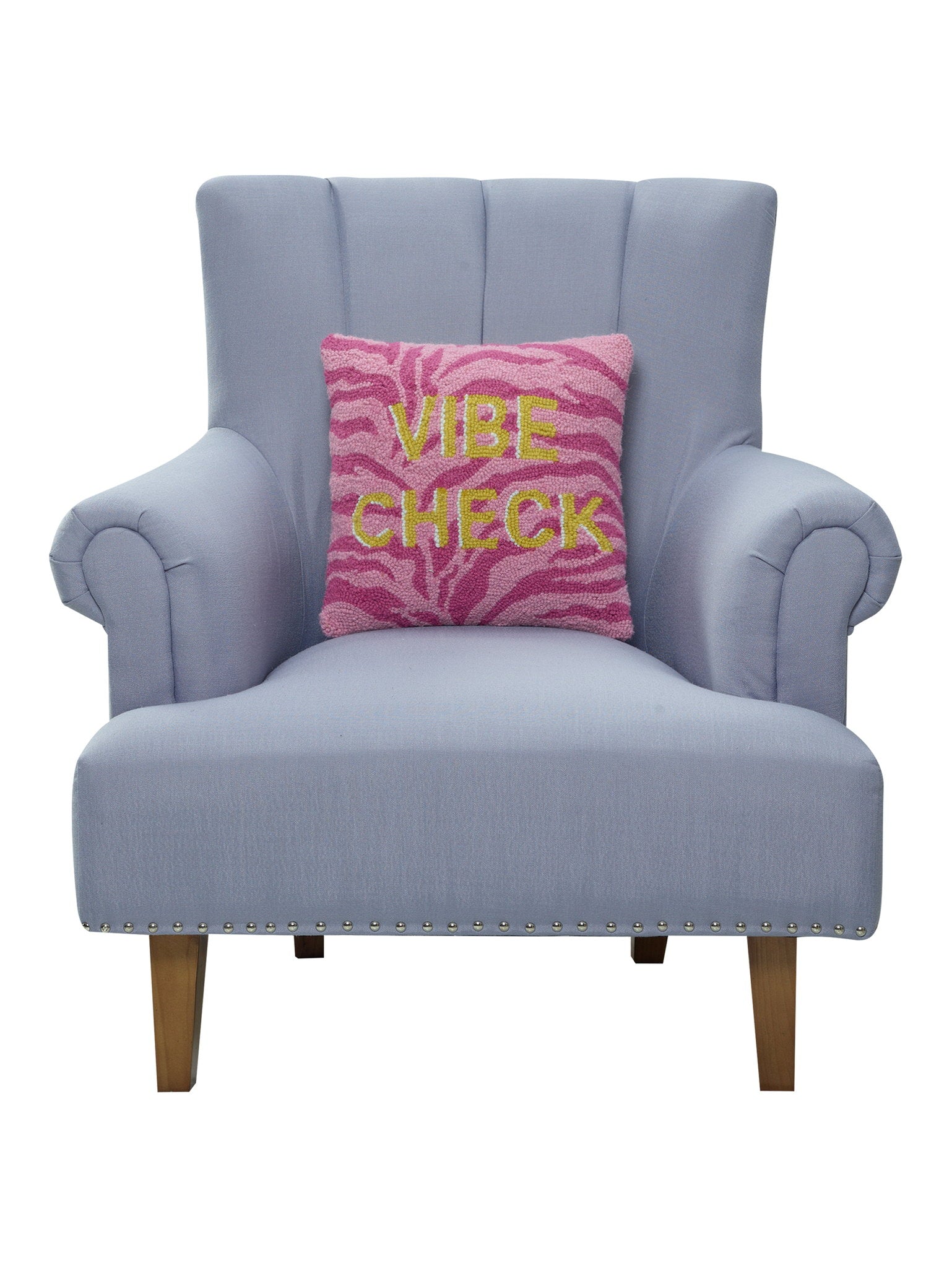 Vibe Check Hooked Wool Throw Pillow on an armchair, showing the throw pillow at room scale, 14x14 inch
