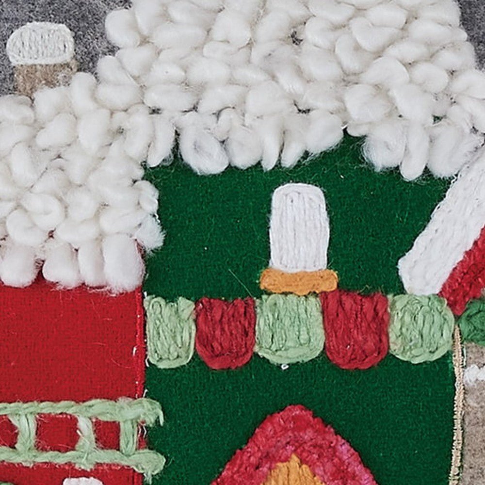 Closeup of Village Felt Embroidered Christmas Throw Pillow showing stitch texture and craftsmanship detail