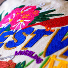 West Virginia State Mountain Travel Embroidered Throw Pillow - close-up detail of hand-embroidered needlepoint stitching