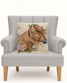 Windswept Horse Hooked Wool Throw Pillow on an armchair, showing the throw pillow at room scale, 18x18 inch