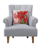 Winter Amaryllis on Pink Hooked Wool Christmas Throw Pillow on an armchair, showing the throw pillow at room scale, 16x16 inch