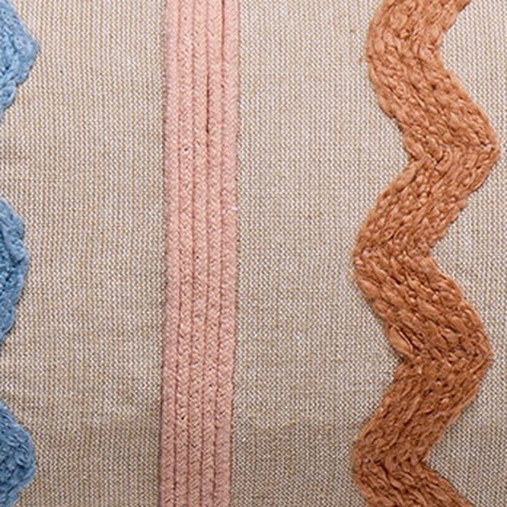 Closeup of Zig-Zag Bolster with Poms Embroidered Throw Pillow showing stitch texture and craftsmanship detail