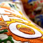 Zion Red Cliffs National Park Embroidered Pillow - close-up detail of hand-embroidered needlepoint stitching